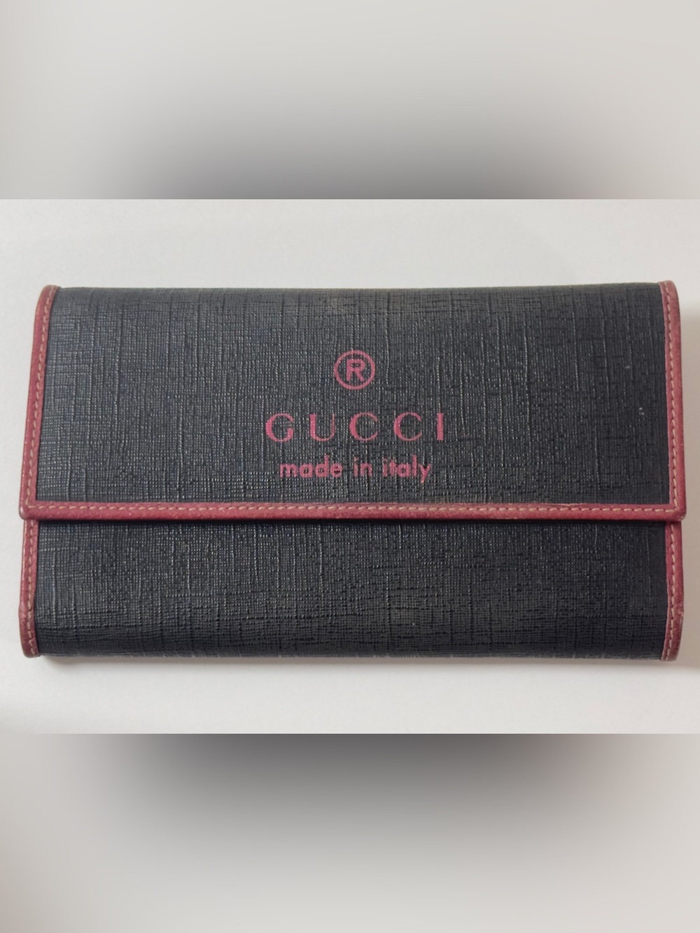 GUCCI- Vintage, but like new   Black Denim & Crimson Leather Trim.